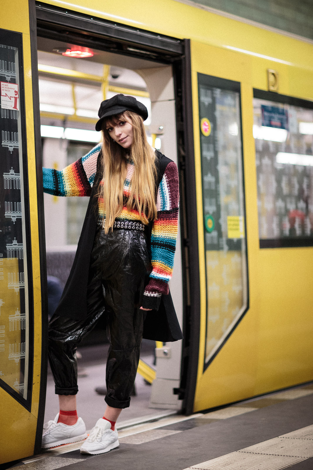 girl with hippie outfit in berlin subway