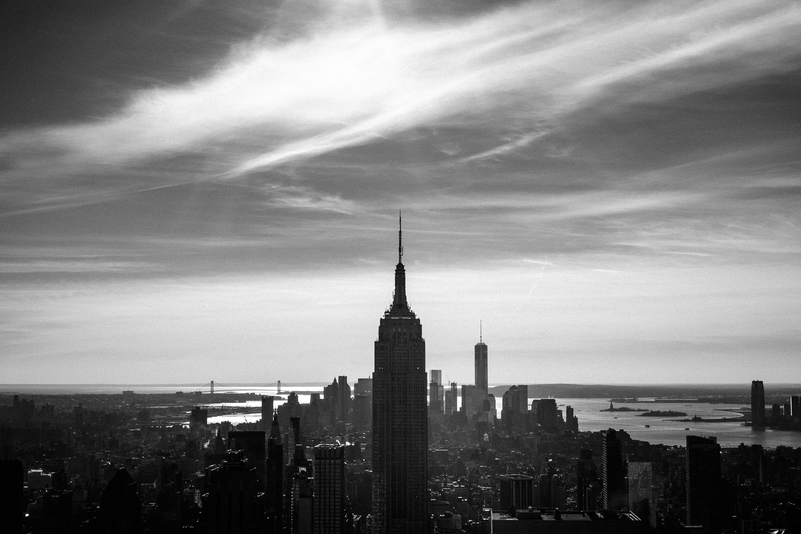 view of south manhattan and empire state building in new york from rockefeller center